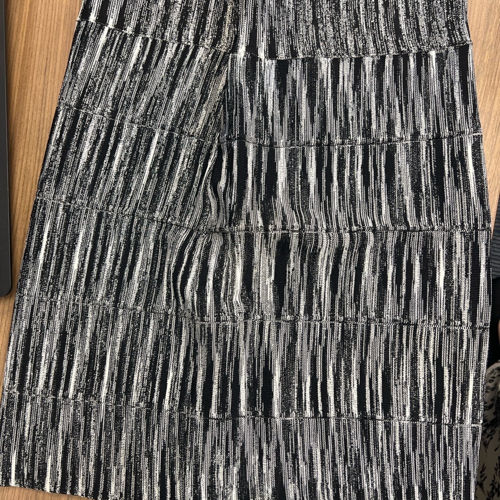 Elegant Black and Silver Striped Skirt Bebe - stained as pictured but clean